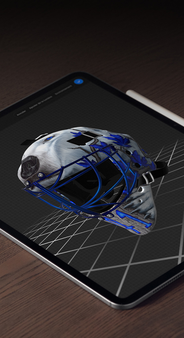 Un iPad affiche le rendu 3D d’un masque de gardien, pour montrer la puissance de la puce M5.