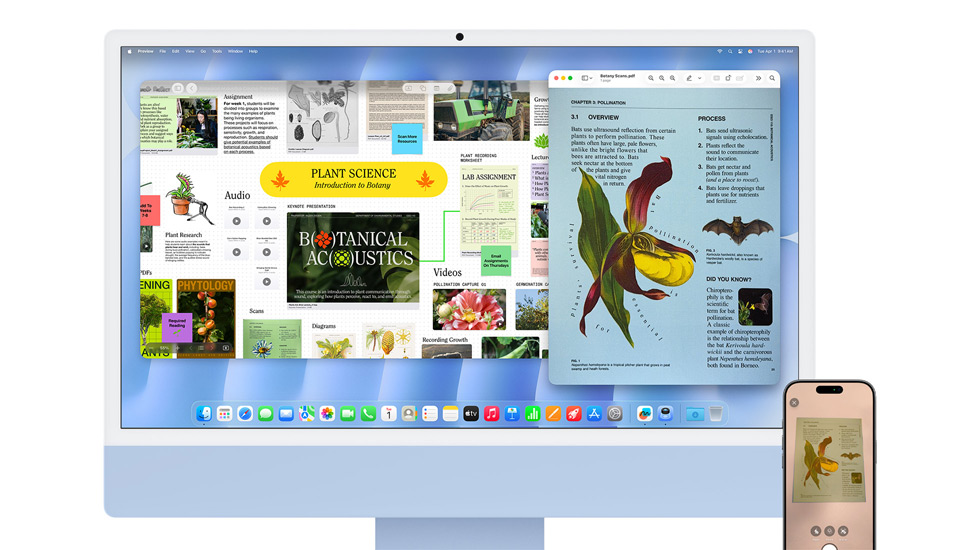 Um iMac e um iPhone apresentam conteúdos vibrantes e o iMac tem o papel de parede do macOS Tahoe.