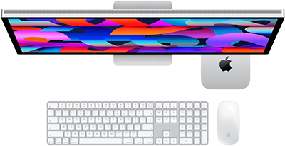 Mac mini smješten ispod Studio Displaya, Magic Keyboard s numeričkom tipkovnicom, Magic Mouse