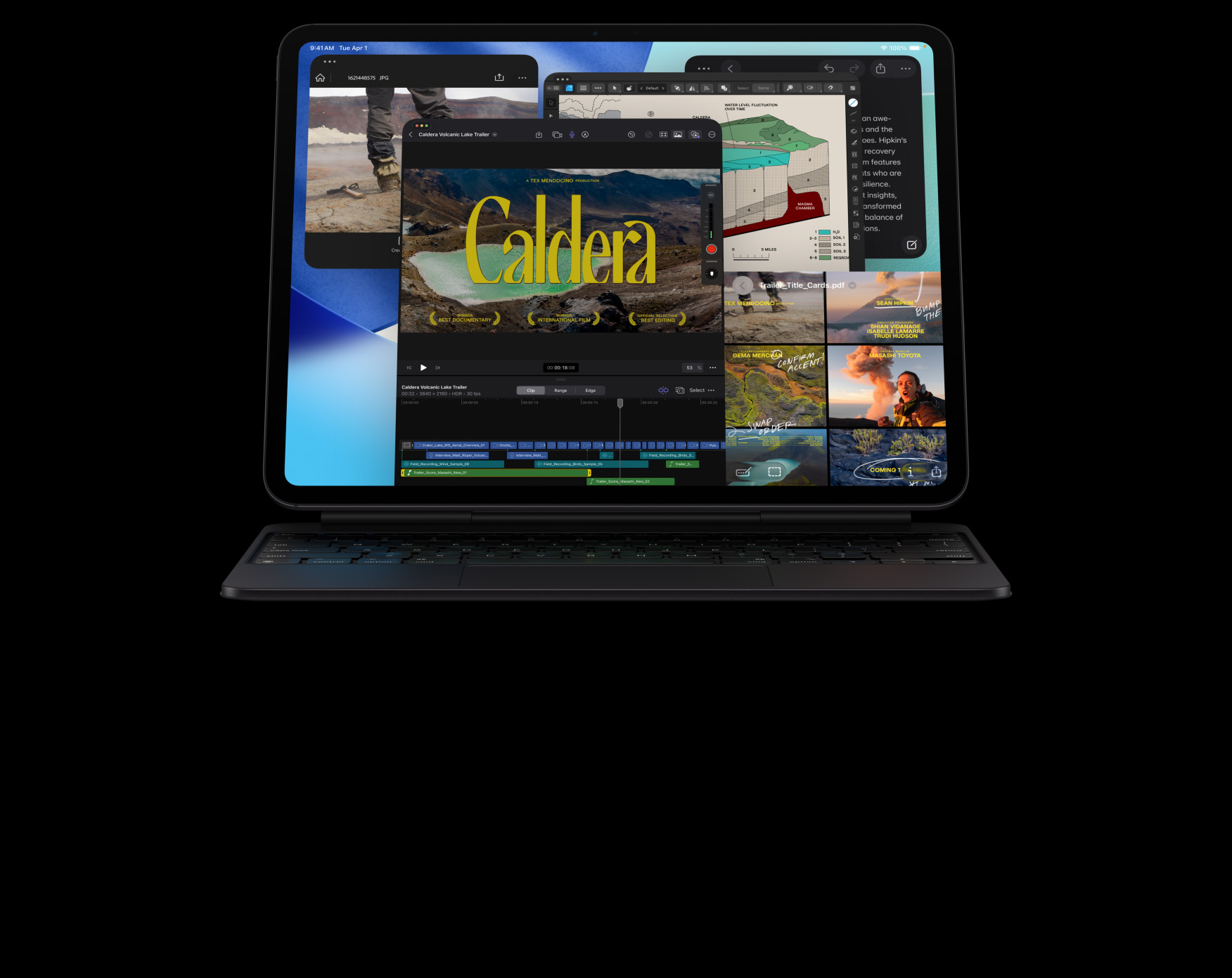 Asztrofekete iPad Pro szemből, fekvő tájolásban, asztrofekete Magic Keyboardhoz csatlakoztatva, a kijelzőn többféle alkalmazásablak: a Final Cut Pro különböző videószerkesztési funkciókkal és idővonallal, a Térképek, a Jegyzetek és médiaklipek