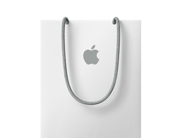 Un sac d’achats Apple Store, blanc, avec logo Apple gris et poignées grises