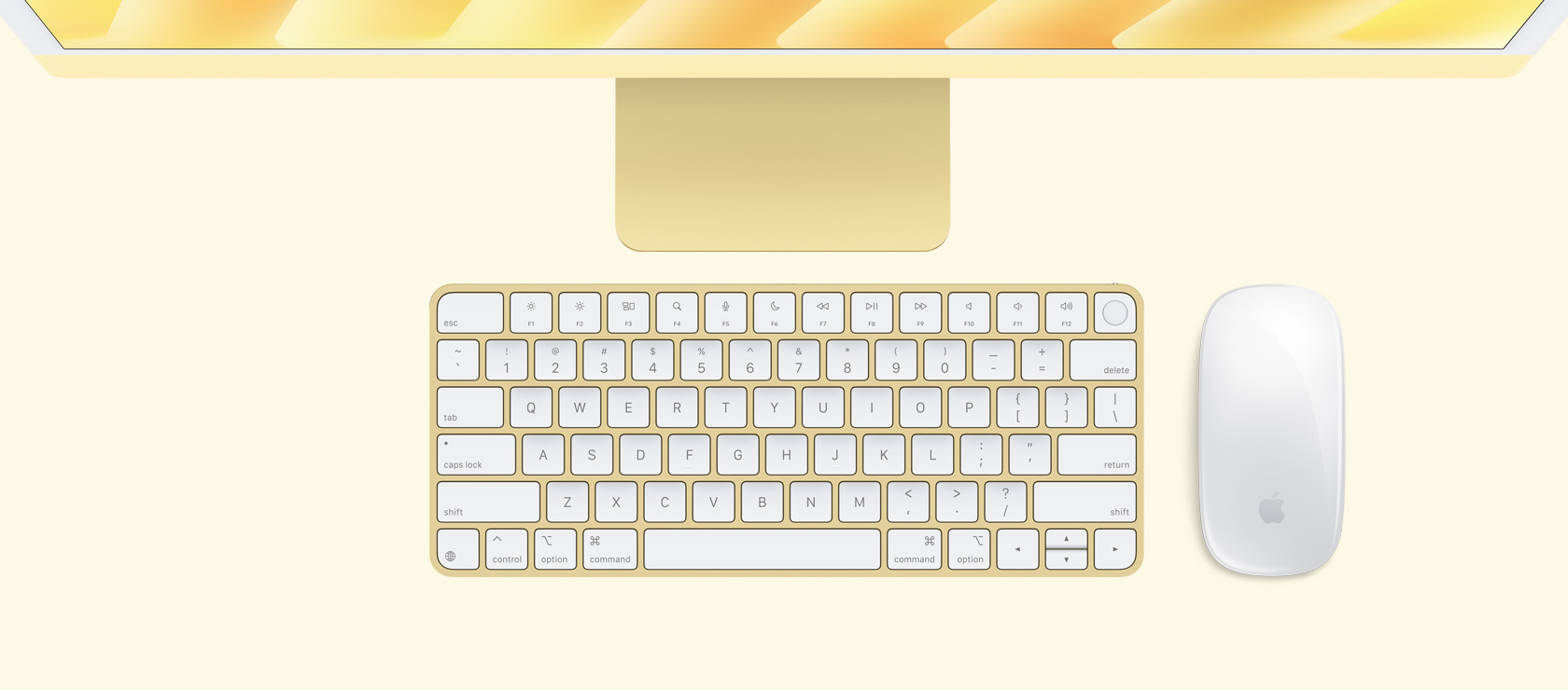 Kollane iMac ülalt alla vaates koos sama värvi hiire ja klaviatuuriga
