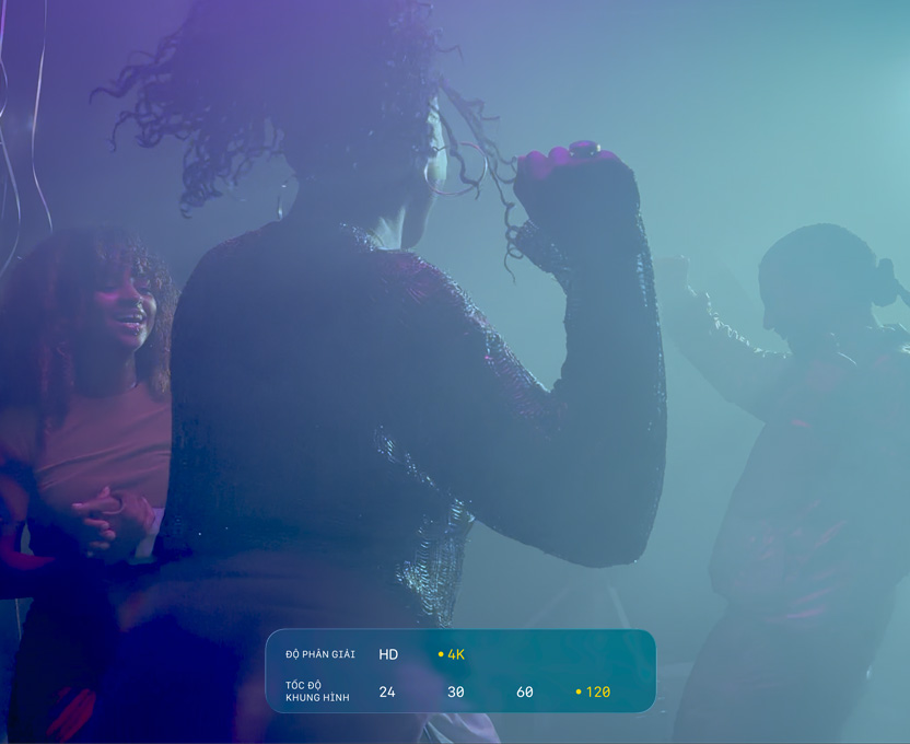 Cảnh quay ba người nhảy múa trong điều kiện quay phim thiếu sáng cho thấy khả năng của 4K Dolby Vision tốc độ 120 fps